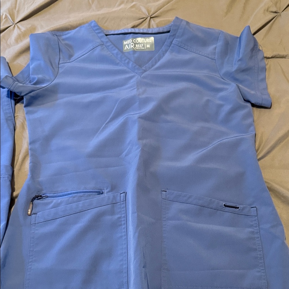 Med Couture Air Blue Scrub Top with Zipper Pocket